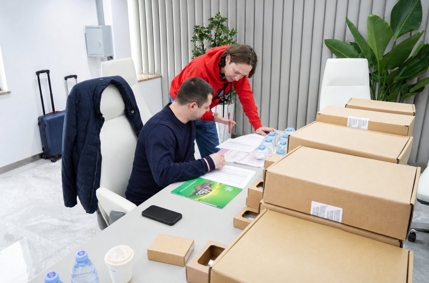 Customer and Moore Automated representative reviewing order documents