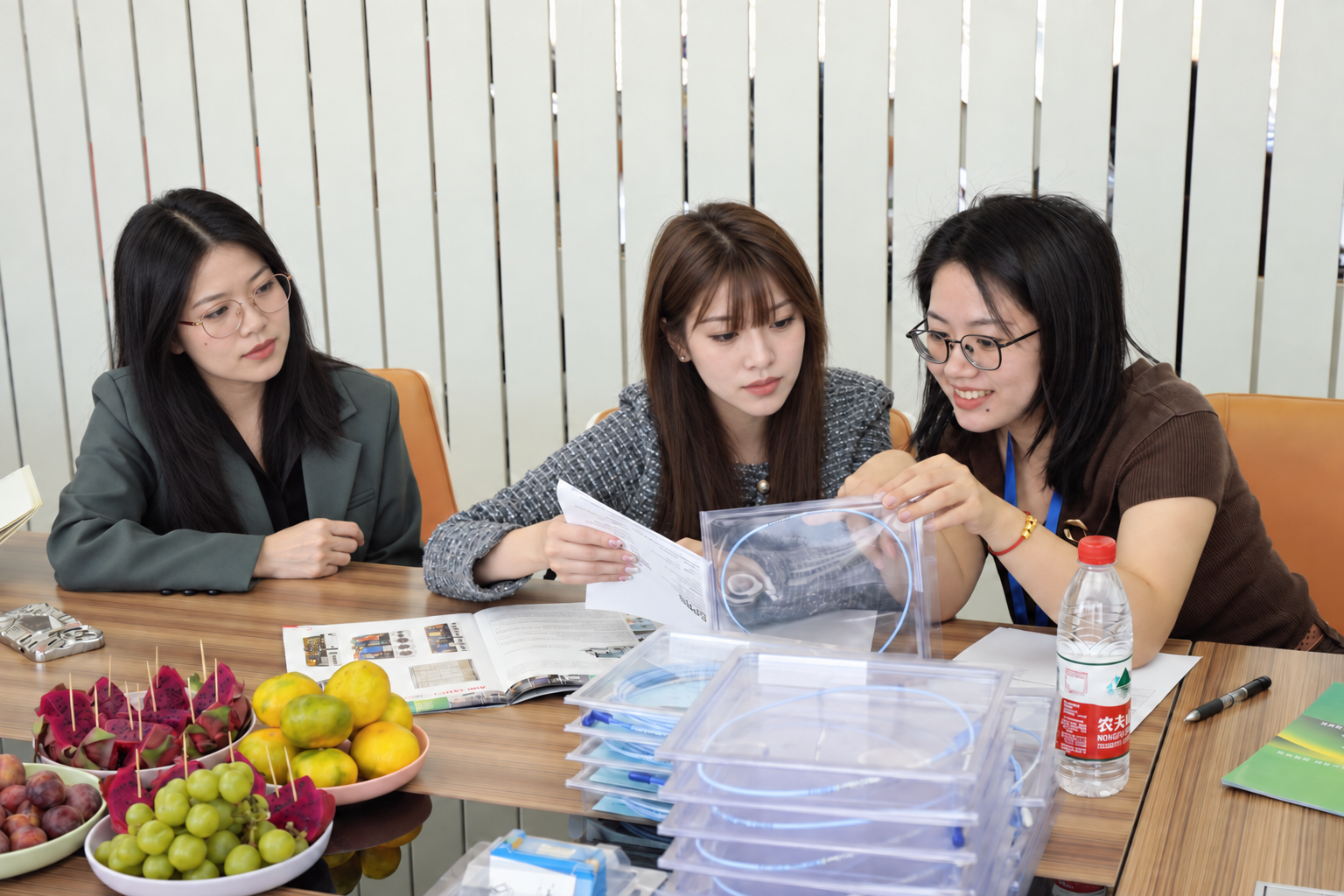 Thai customer reviewing Bently Nevada 3300 XL parts with Leonia during an on-site inspection